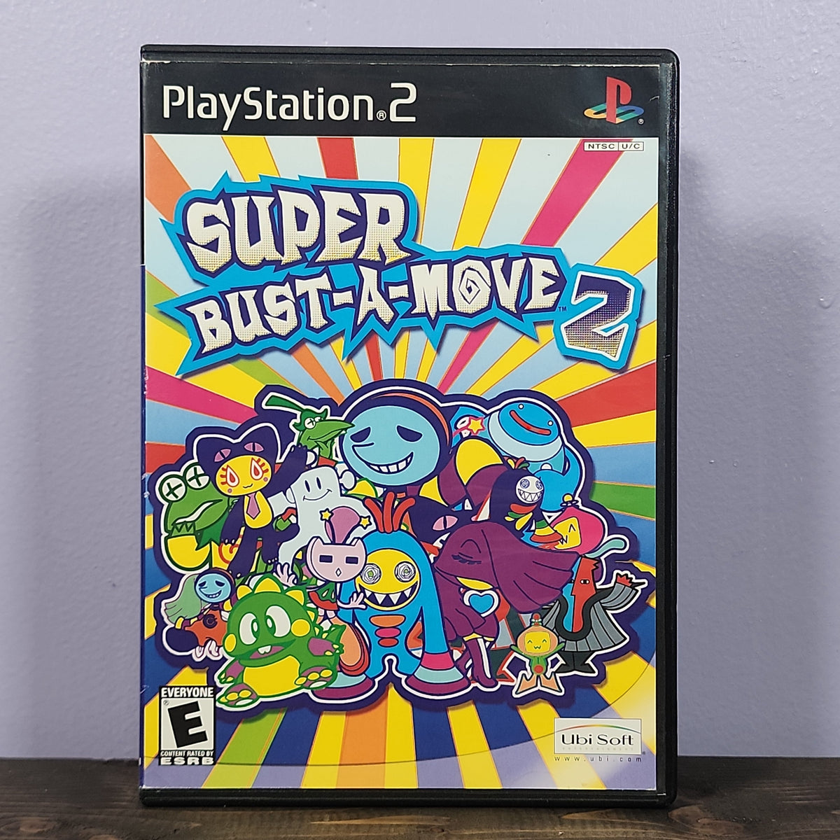 Playstation 2 - Super Bust-A-Move 2 Retrograde Collectibles CIB, E Rated, Matching, Playstation 2, PS2, Puzzle, Taito, Ubisoft Preowned Video Game
